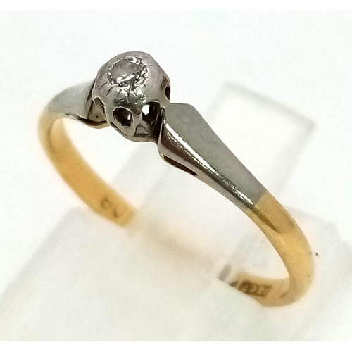 603 - An Antique 18K, Platinum and Diamond Solitaire Ring. Size J/K. 1.7g total weight.