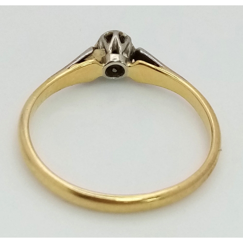 603 - An Antique 18K, Platinum and Diamond Solitaire Ring. Size J/K. 1.7g total weight.