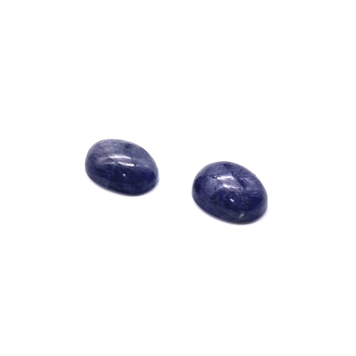 700 - A Pair of Cabochon Tanzanite. 22.85cts in total.