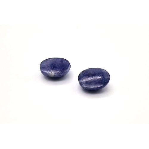 700 - A Pair of Cabochon Tanzanite. 22.85cts in total.