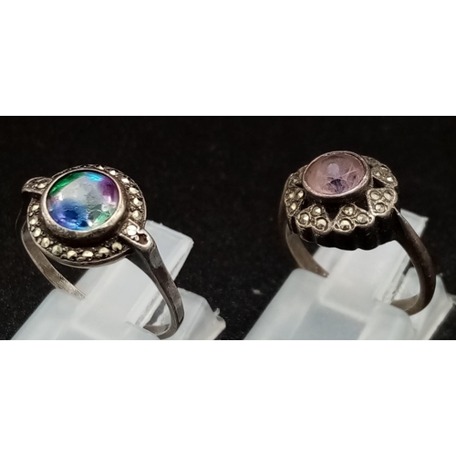 740 - Two Antique Silver Rings. Amethyst with marcasite and mystic topaz with marcasite. Sizes J and O.