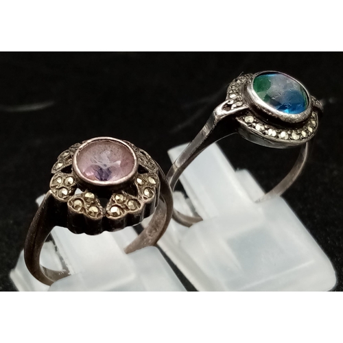 740 - Two Antique Silver Rings. Amethyst with marcasite and mystic topaz with marcasite. Sizes J and O.