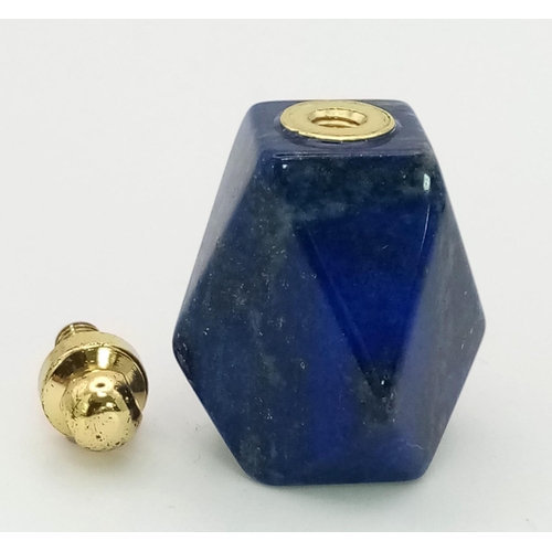 761 - A Chunky Lapis Lazuli Pendant. 3.5cm x 2cm.  20.48G.