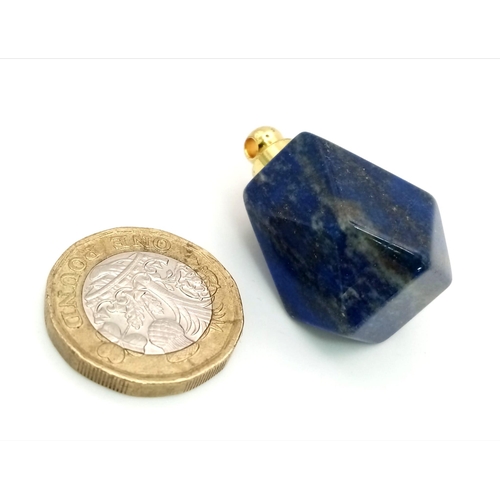 761 - A Chunky Lapis Lazuli Pendant. 3.5cm x 2cm.  20.48G.