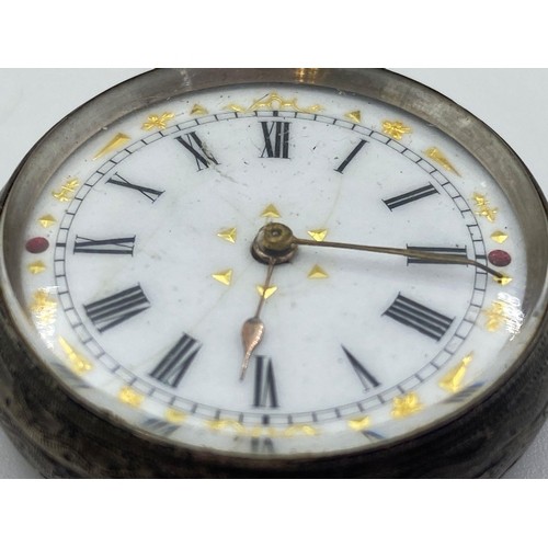 1200 - AN ANTIQUE SOLID SILVER LADIES POCKET WATCH WITH WHITE FACE AND ROMAN NUMERALS. FULL WORKING ORDER I... 