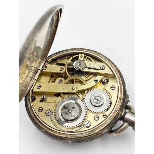 1200 - AN ANTIQUE SOLID SILVER LADIES POCKET WATCH WITH WHITE FACE AND ROMAN NUMERALS. FULL WORKING ORDER I... 