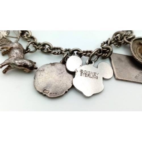 1481 - Vintage Silver Charm Bracelet. 28.4grams. 32cm length.