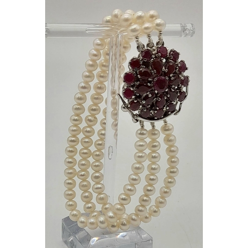 1477 - 925 Silver, Three Strand Pearl Bracelet with a Beautiful Ruby Gemstone clasp. Approx 18cm length, To... 