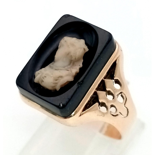 1399 - An Antique Victorian Mid-Karat Rose Gold Onyx Cameo Ring. 
Size P. 6.07g total weight.