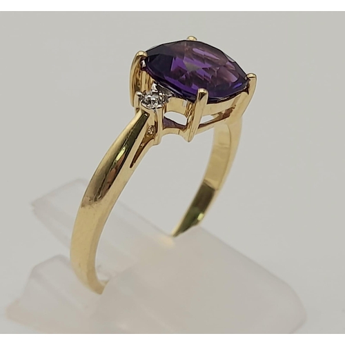 1466 - A 9K GOLD AMETHYST AND DIAMOND RING .  2.6gms   size P