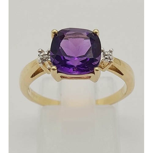 1466 - A 9K GOLD AMETHYST AND DIAMOND RING .  2.6gms   size P