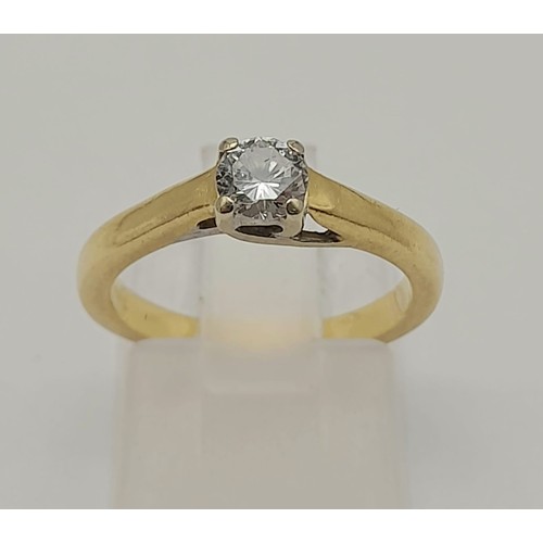 1339 - AN 18K GOLD DIAMOND RING WITH A .25ct CENTRE STONE BEING A TOP QUALITY BRILLAINT CUT DIAMOND.  3.4gm... 