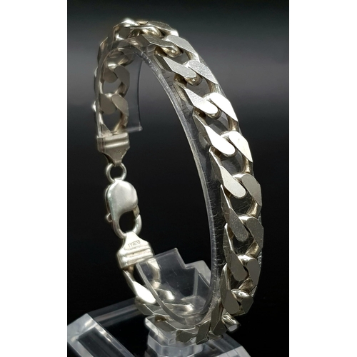 1315 - A 925 Sterling Silver Flat Curb Link Bracelet. 21cm. 32g