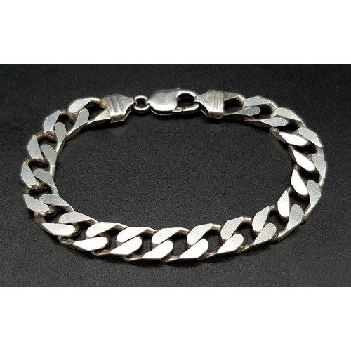 1315 - A 925 Sterling Silver Flat Curb Link Bracelet. 21cm. 32g