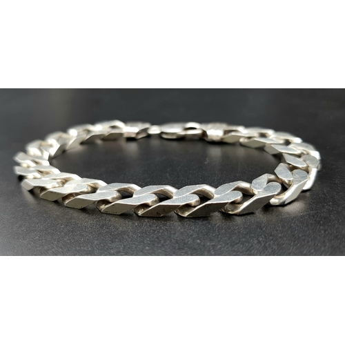 1315 - A 925 Sterling Silver Flat Curb Link Bracelet. 21cm. 32g