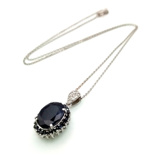 1323 - An 18K White Gold, Sapphire and Diamond Pendant on an 18K White Gold Disappearing Necklace. 2 and 40... 