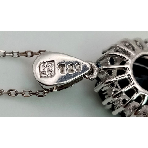 1323 - An 18K White Gold, Sapphire and Diamond Pendant on an 18K White Gold Disappearing Necklace. 2 and 40... 