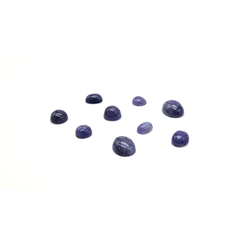 1088 - A lot of 9  Tanzanite Cabochon- Earth Mined. 28cts in total.