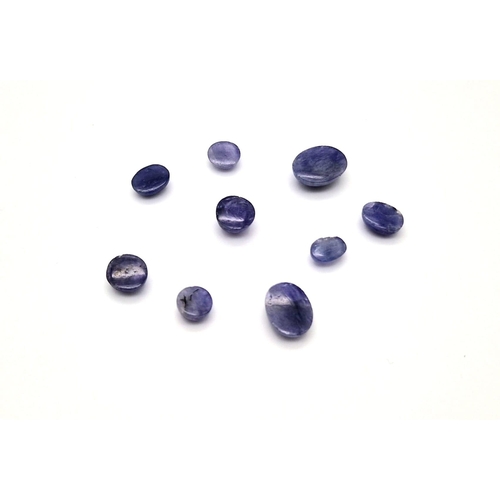 1088 - A lot of 9  Tanzanite Cabochon- Earth Mined. 28cts in total.