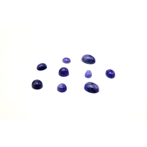 1088 - A lot of 9  Tanzanite Cabochon- Earth Mined. 28cts in total.