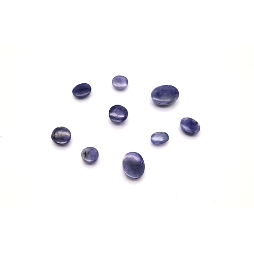 1088 - A lot of 9  Tanzanite Cabochon- Earth Mined. 28cts in total.