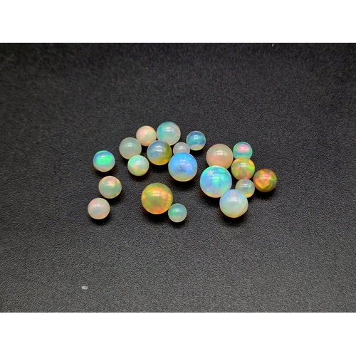 1102 - A Lot of Ethiopian Fire Opal Balls. 21.25ct in total.