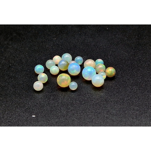 1102 - A Lot of Ethiopian Fire Opal Balls. 21.25ct in total.