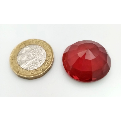 111 - A show stopping, large (63 carats) RUBY. Round cut, with a vivid pigeon blood red colour, excellent ... 