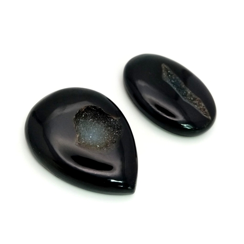 293 - Two natural curiosities: Black agate micro-geodes, cut and polished to reveal quartz microcrystals i... 