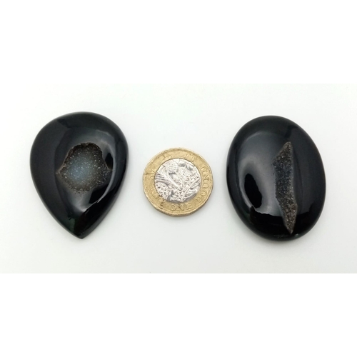 293 - Two natural curiosities: Black agate micro-geodes, cut and polished to reveal quartz microcrystals i... 