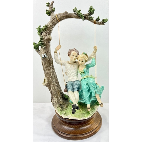 1235 - A Large Giuseppe Armani Capo Di Monte -Lovers on Swing. 45cm in height.