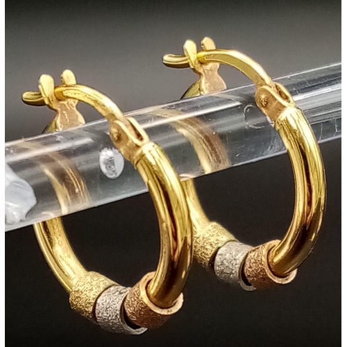 489 - A Pair of 9K Three-Colour Gold Small Hoop Earrings. 1.15g total weight.