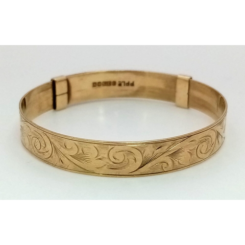 677 - A Vintage 9K Yellow Gold Small Childs Bangle. Adjusts to 4.5cm inner diameter. 5.81g