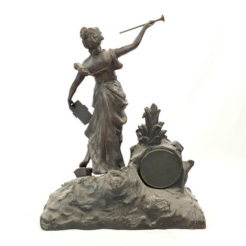 1301 - An Antique Spelter Mantle Clock Decorated with a Woman Blowing Her Own Horn - In favour of Dickens, ... 