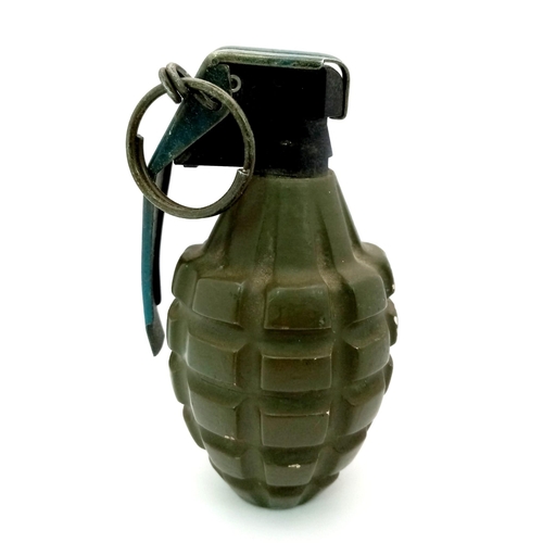 1228 - Inert US “Pineapple” M73 Practice Fragmentation Grenade. Top of grenade lever/spoon marked ‘GR F PRA... 