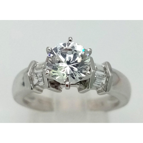 1259 - 9k White Gold CZ Ring. Total Weight 4.2grams. Size M.