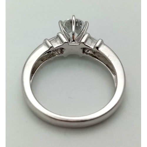 1259 - 9k White Gold CZ Ring. Total Weight 4.2grams. Size M.