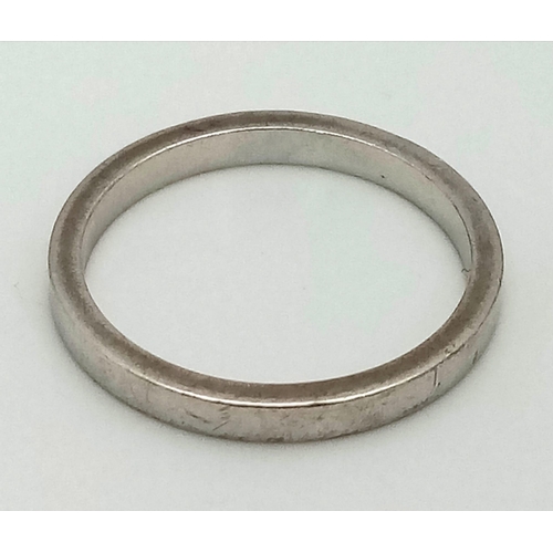 127 - An 18K white gold half eternity ring with diamonds. Ring size: m, weight: 2.54 g.