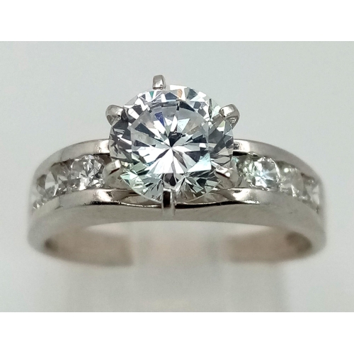 1271 - 9k White Gold CZ Ring. Total Weight 4.1grams. Size N