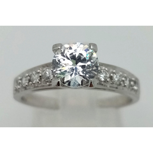 1275 - 9k White Gold CZ Ring. Total Weight 2.6grams. Size O.