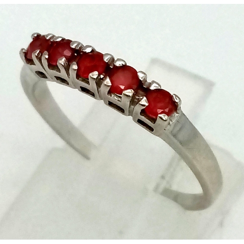 1308 - A 9K White Gold Garnet Ring. Size N. 1.83g