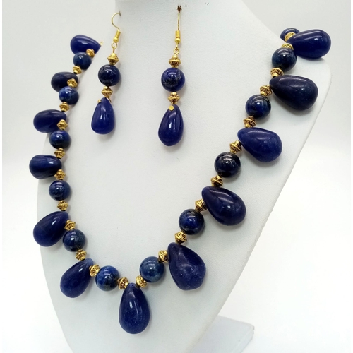 188 - An Art Nouveau lapis lazuli necklace and earrings set. Necklace length: 57 cm, earrings length: 6 cm... 