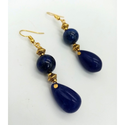 188 - An Art Nouveau lapis lazuli necklace and earrings set. Necklace length: 57 cm, earrings length: 6 cm... 