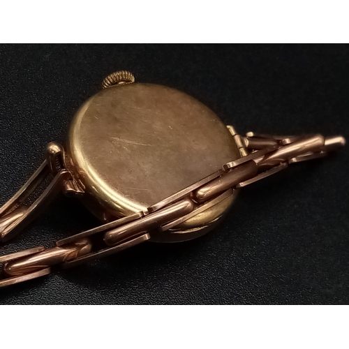 22 - An Antique 9K Rose Gold Benson Ladies Watch. 9K rose gold bracelet and case - 26mm. Mechanical movem... 