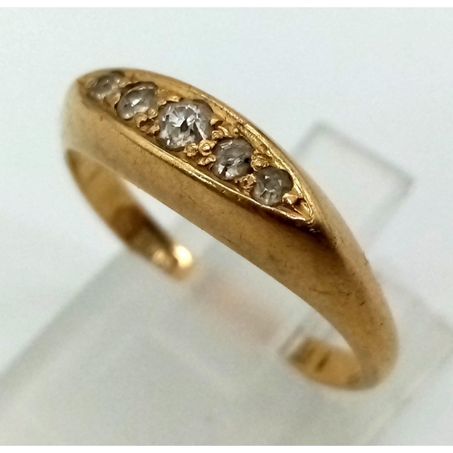 393 - A vintage, 18K yellow gold ring with five rose cut diamonds. Ring size: M, weight: 2.36 g.