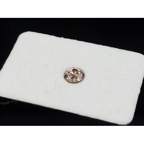 580 - A very desirable, 0.33 carat, cognac coloured, brilliant cut diamond.