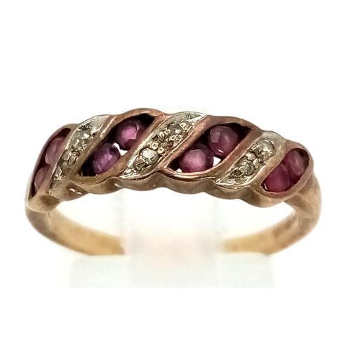 582 - A  Vintage 9K Yellow Gold Ruby and Diamond Ring. Size M. 2.23g total weight.