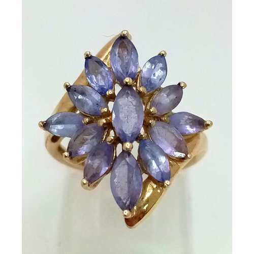 681 - A 9K Yellow Gold Amethyst Floral-Design Ring. Size J/K.
3.03g total weight.