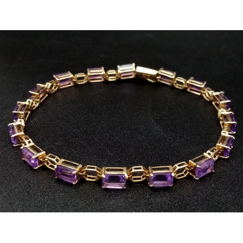 69 - A Vintage 9K Gold Amethyst Tennis Bracelet. 18cm. 7.83g total weight.