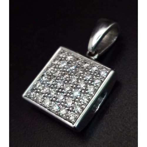 1090 - An 18K white gold pendant with diamonds (0.5 carats appr.). Height: 18 mm, weight: 2.97 g.